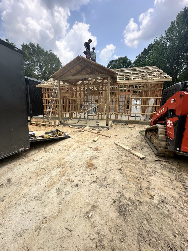 Construction Crew Framing a custom Building for N&L Construction